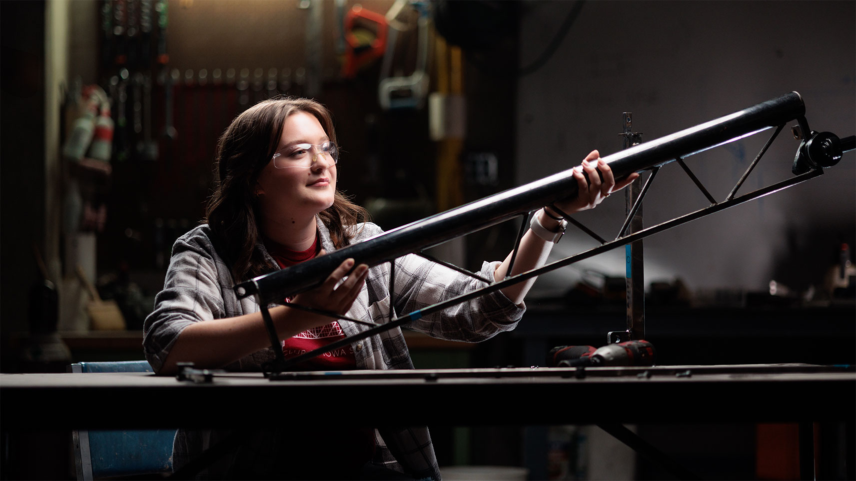 Sydney Hyzy poses with steel bridge replica